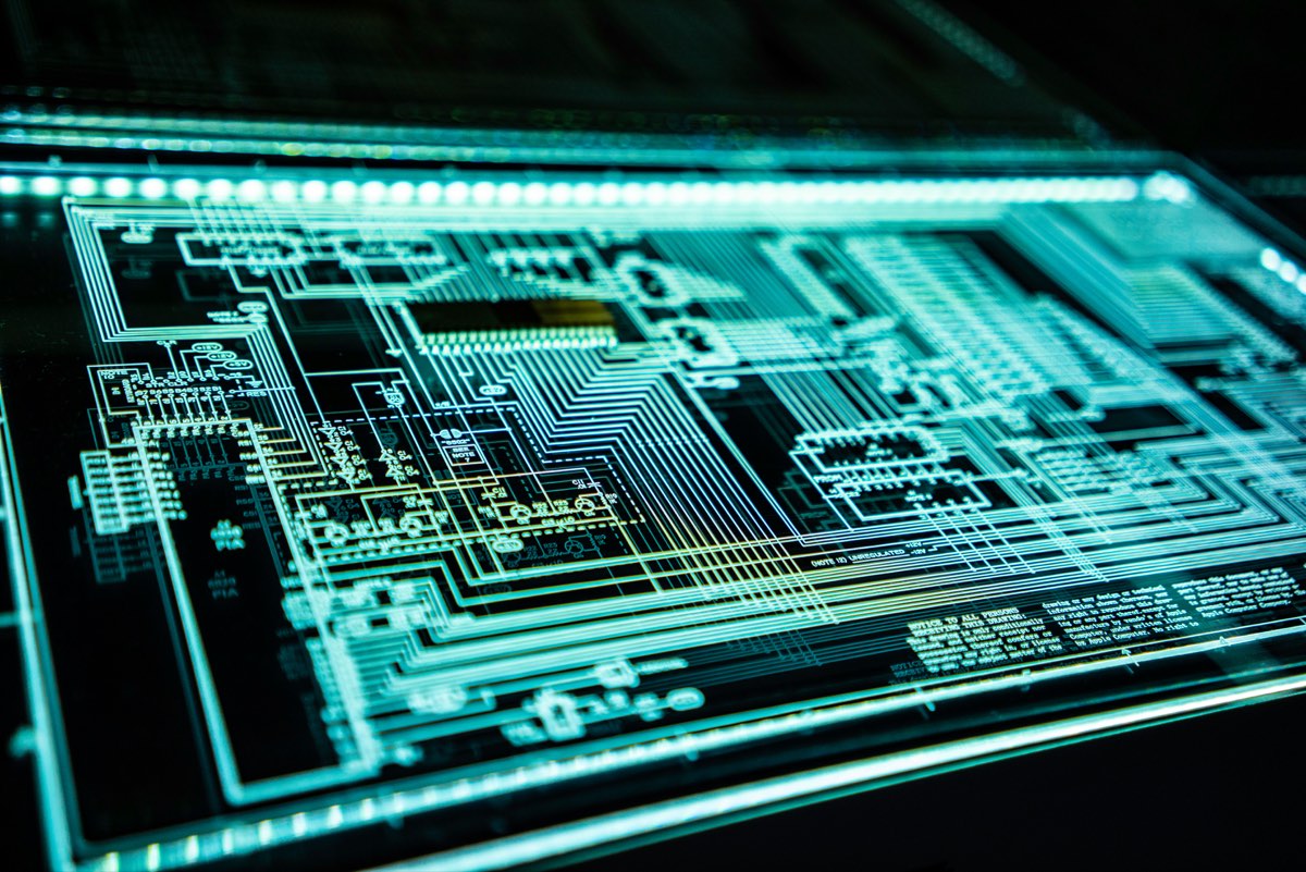 Digital technology workspace representing AI documentation and federal contract disclosure