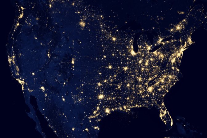 United States lights at night representing the protected national cloud boundary behind Microsoft GCC High pricing